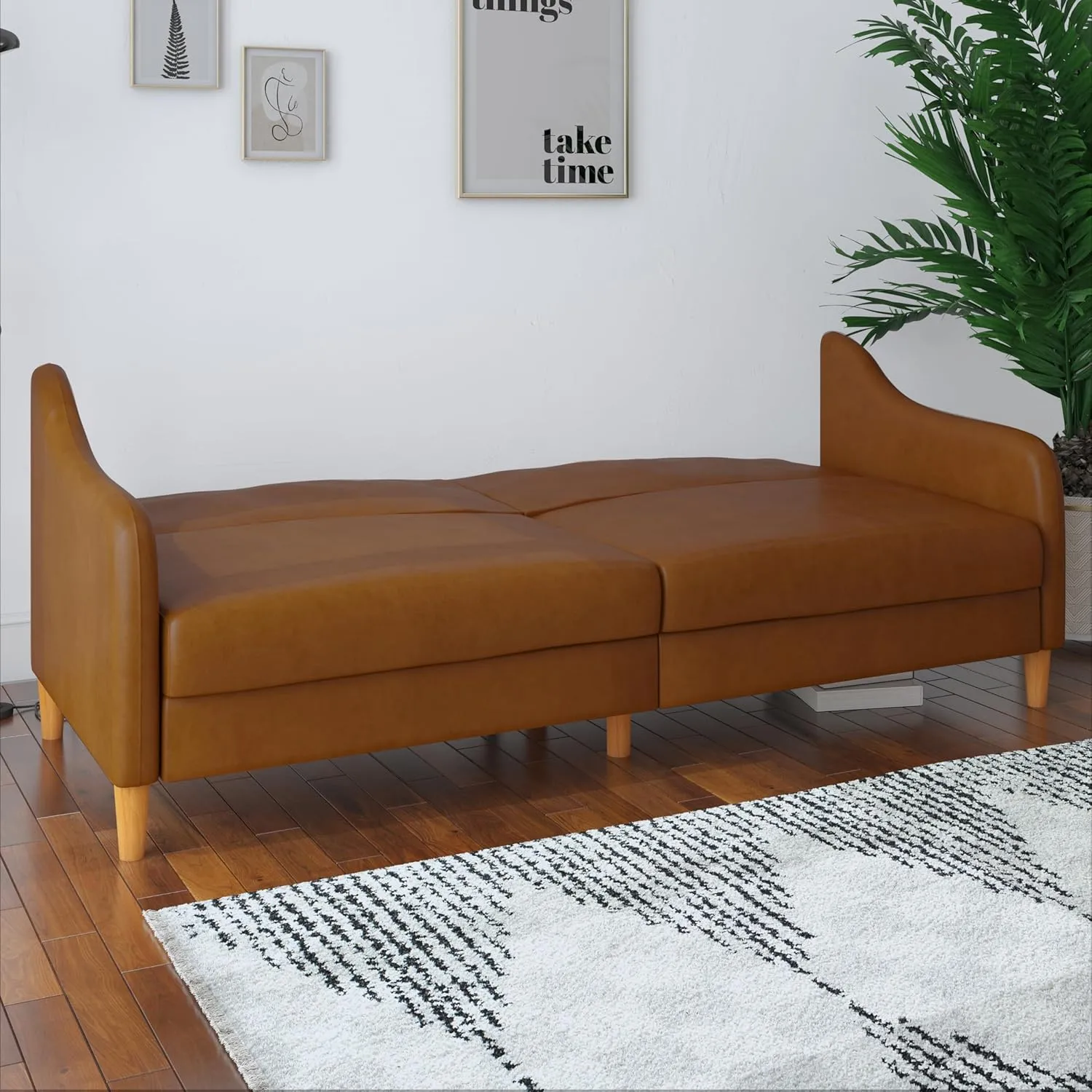 DHP Jasper 77 Inch Futon Sofa Bed in Faux Leather, Modern Upholstered Couch Sleeper with Sloped Arms, Camel