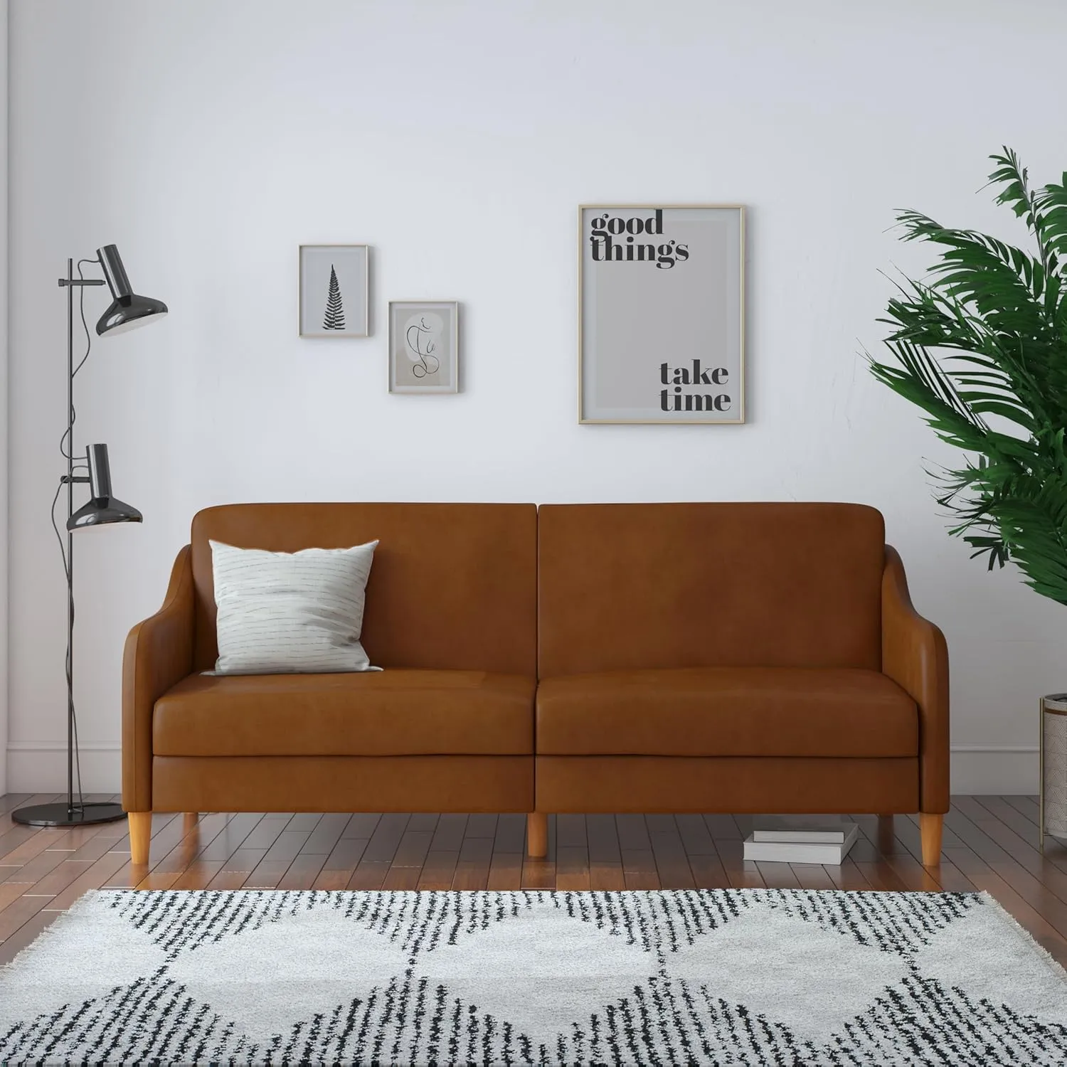 DHP Jasper 77 Inch Futon Sofa Bed in Faux Leather, Modern Upholstered Couch Sleeper with Sloped Arms, Camel