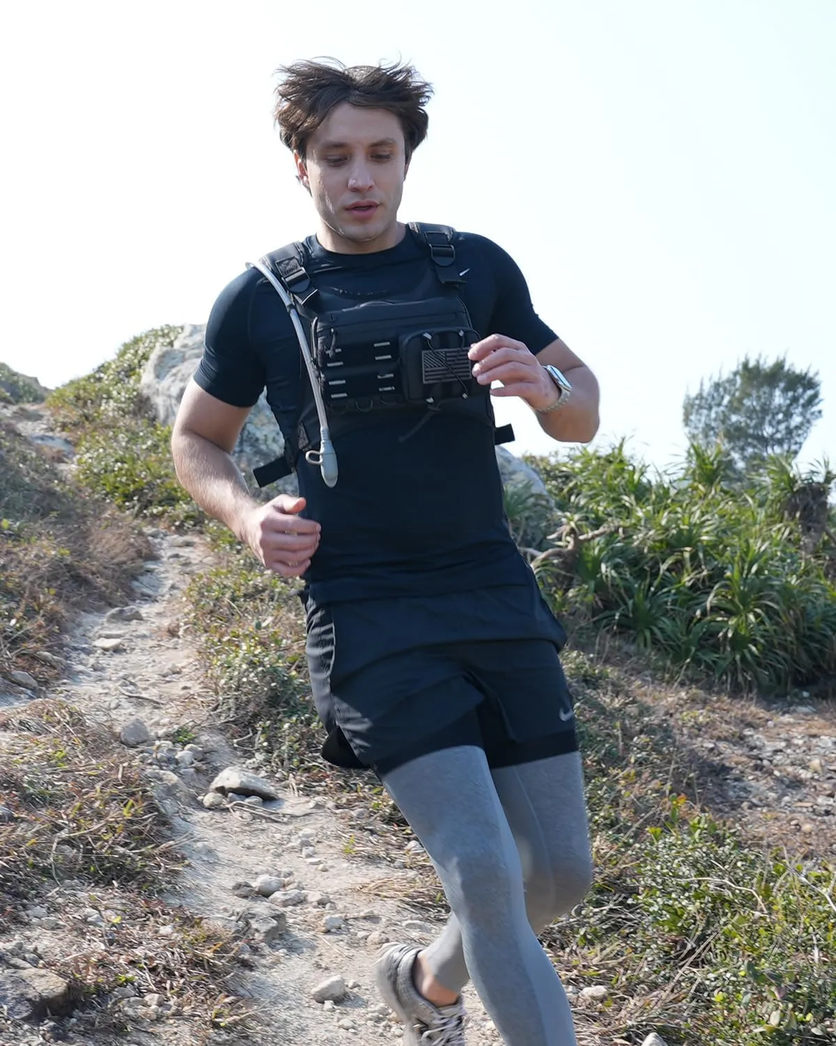 Running Vest with 2L Water Bladder, USA Original Patent, Lightweight Adjustable Chest Pack with Pistol Holster, Reflective Running Hydration Vest for Women Men for Hiking Marathon